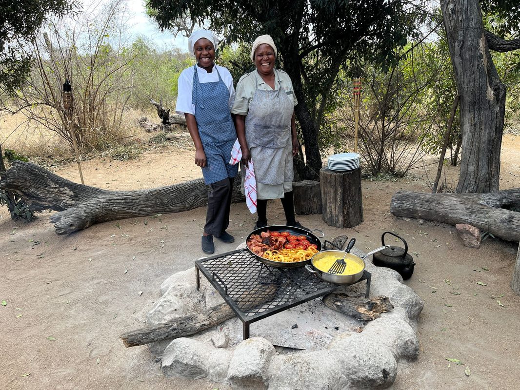Bush breakfast with community staff at Pungwe Safari Camp